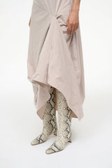 Wally boot with white snake-print shaft and low heel