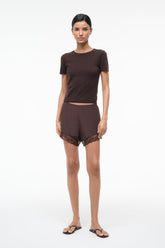 VON silk short front view with lace hem and elastic waistband, dark earth-brown