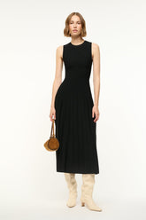 Black sleeveless midi knit dress, crew neck and fitted bodice with pleated skirt