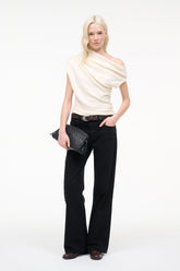 Ivory knit one-shoulder draped cowl sweater, side view