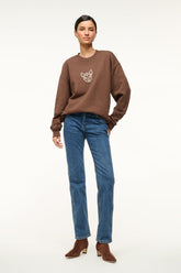 Brown oversized crewneck sweatshirt with dog graphic front and long sleeves