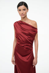 Burgundy silk maxi dress with one-shoulder draped satin bodice and gathered waist