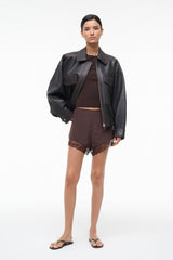 VON silk short with lace hem and elastic waistband, earth-toned
