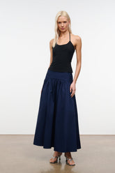 Navy gathered midi skirt with elastic waistband and full pleated tiers