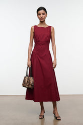 Burgundy sleeveless midi dress, fitted bodice and full A-line skirt