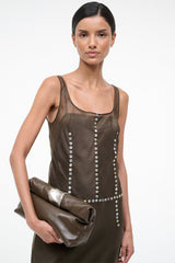 Dark taupe leather cuff clutch held forward, silver top clasp and zipper detail