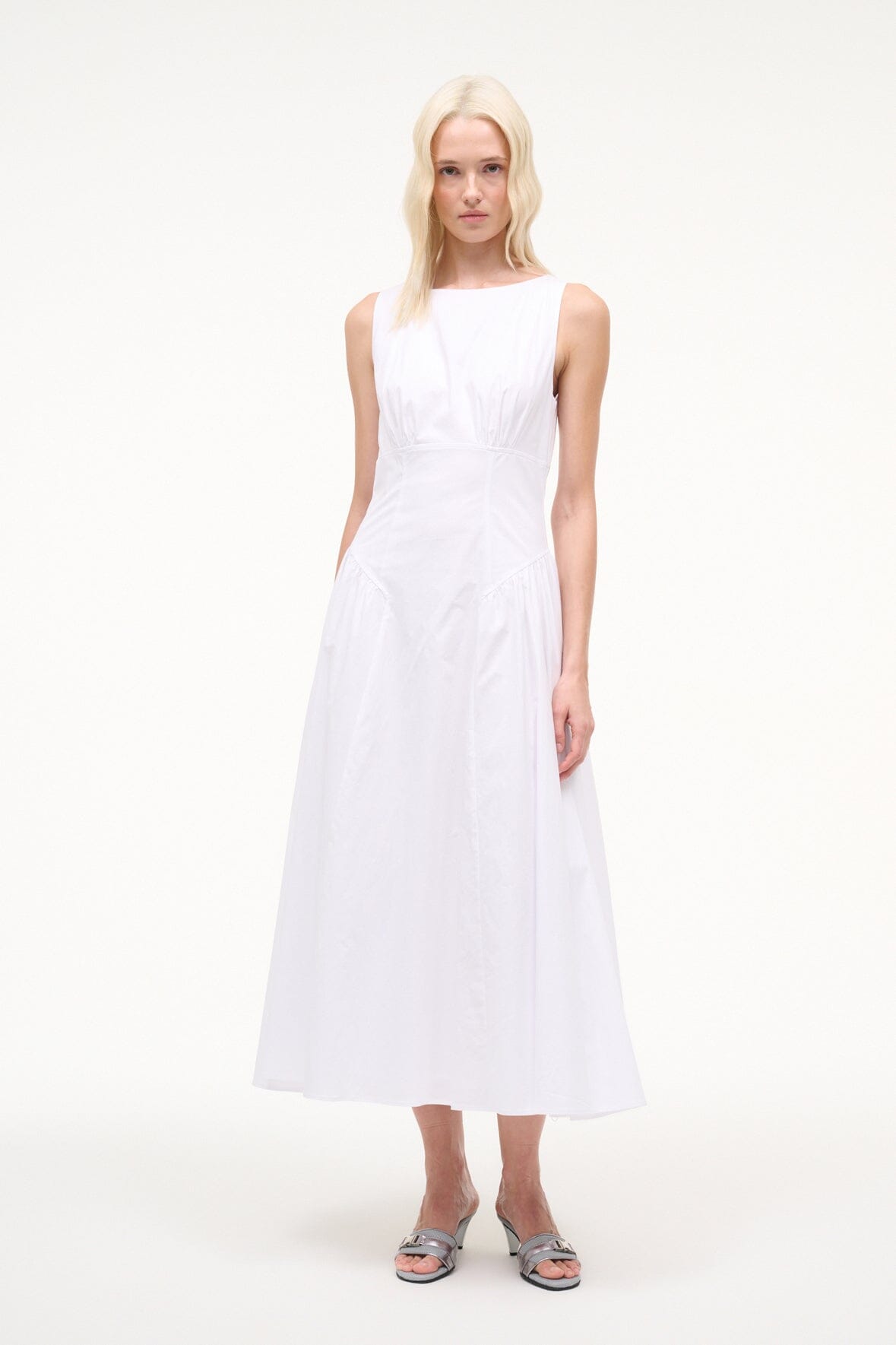 White sleeveless midi dress with scoop neckline and nipped waist flare