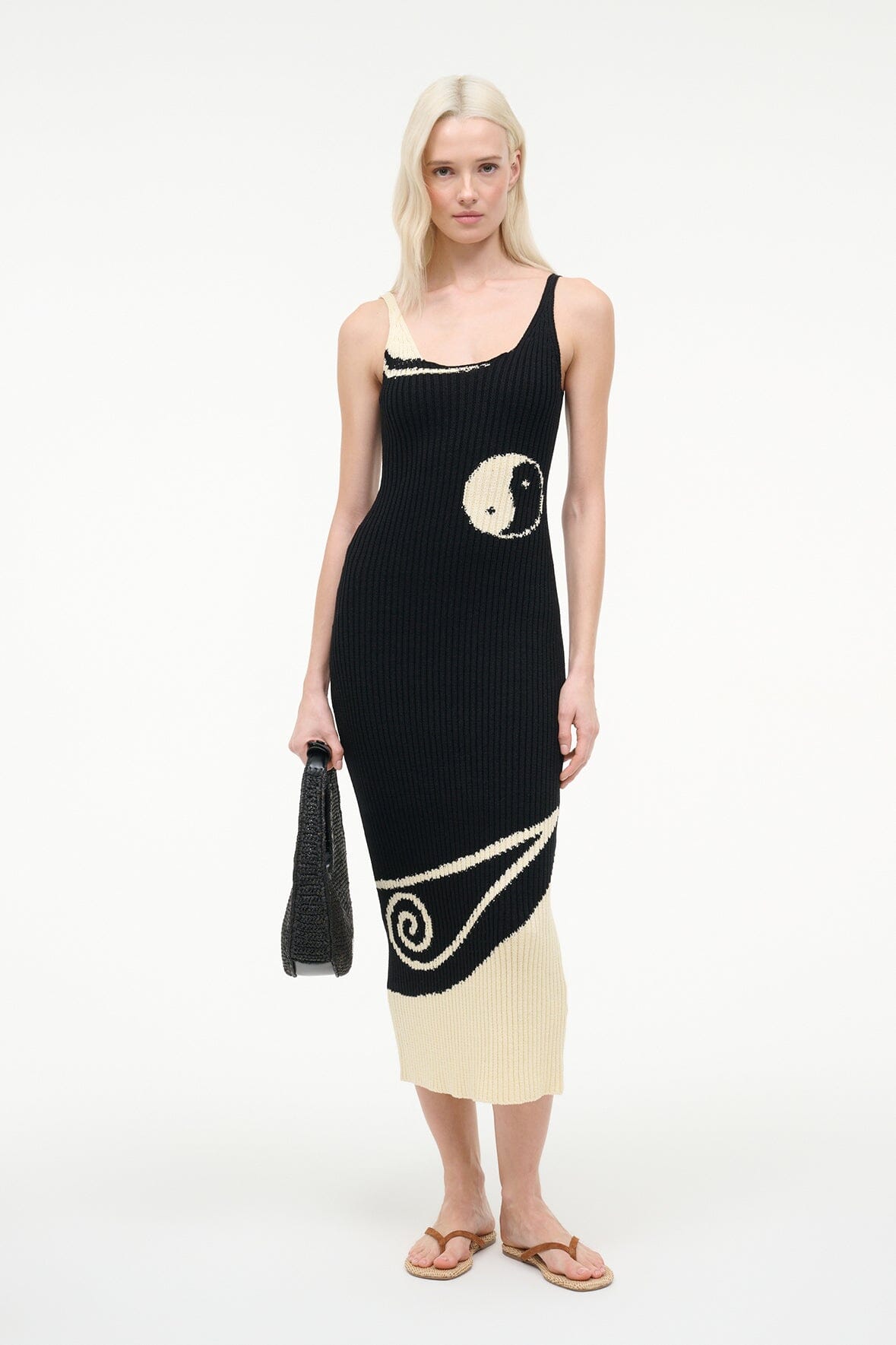 Ribbed midi dress with spaghetti straps, black base, ivory yin-yang graphic at hem
