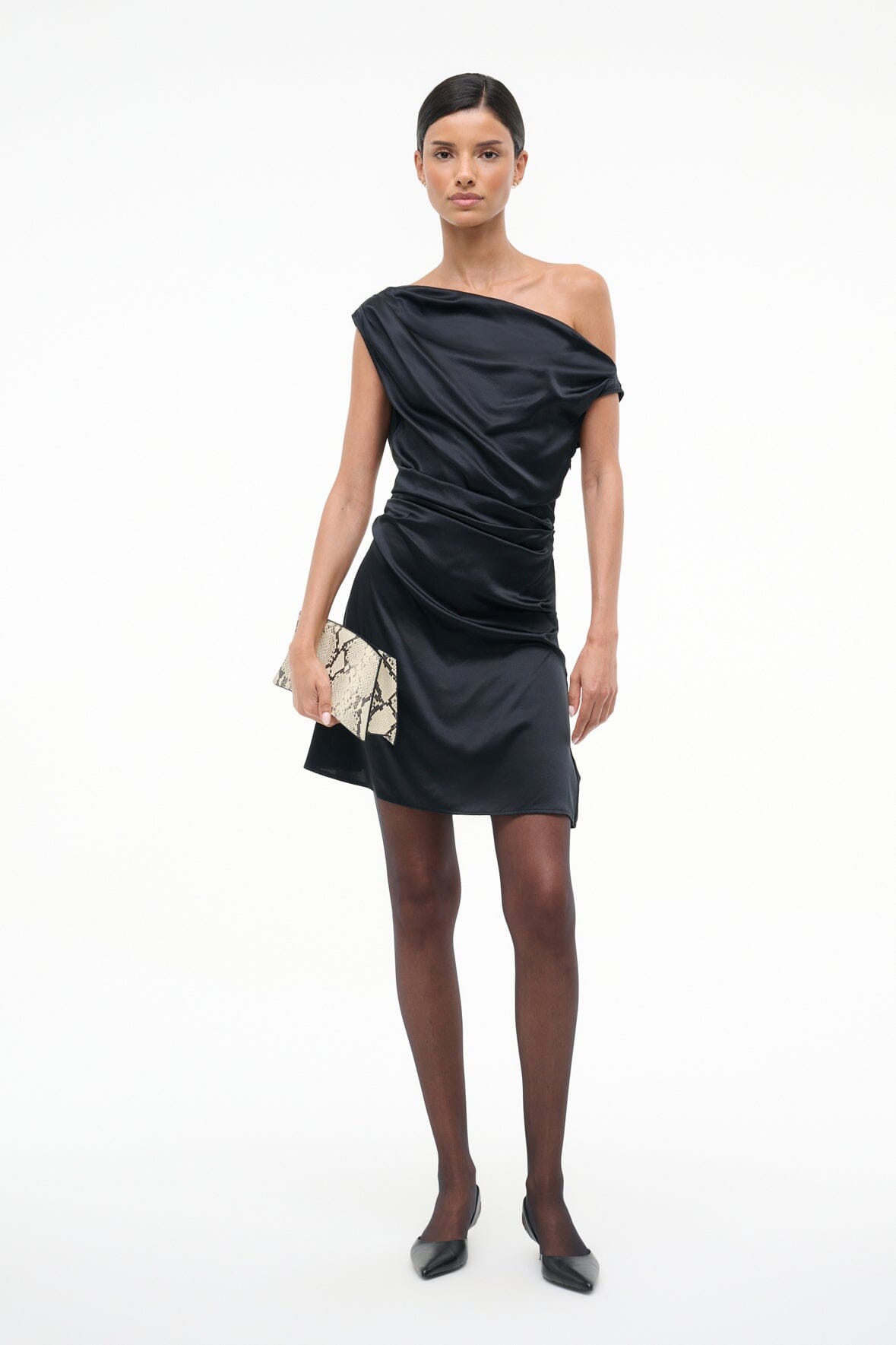 Black one-shoulder mini silk dress with gathered drape and side ruching, with clutch
