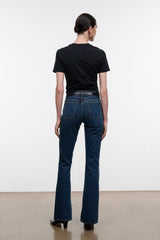 Indigo flare jeans, back view with belt loops and center seam