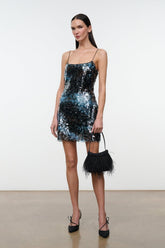 Blue sequin mini dress with spaghetti straps and feather trim at hem