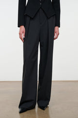 Tailored wide-leg trousers with front crease and full-length drape