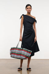 Black one-shoulder midi dress with tied shoulder bow and gathered side detail