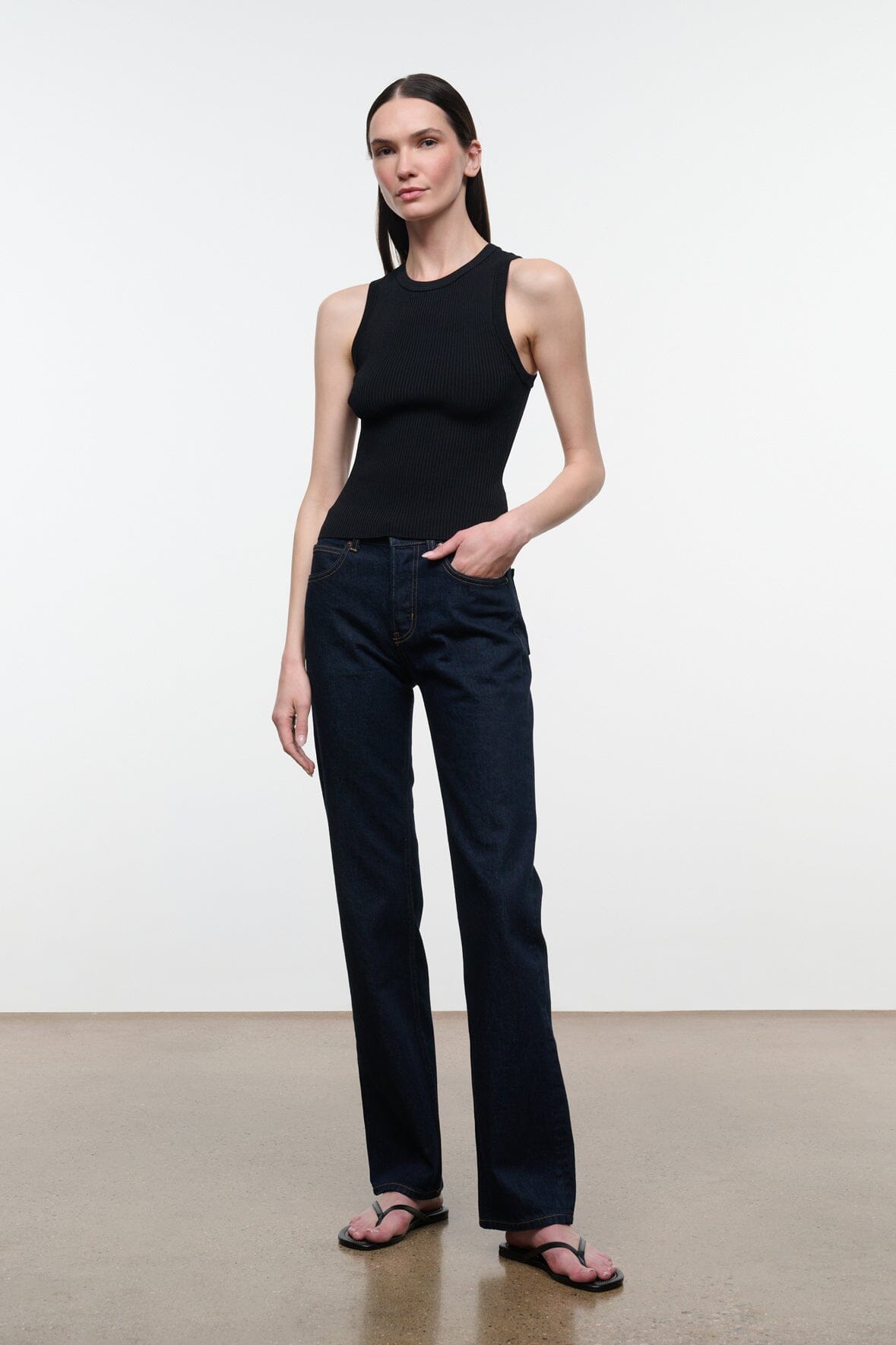 Women’s straight-leg indigo jeans with five-pocket design and dark wash