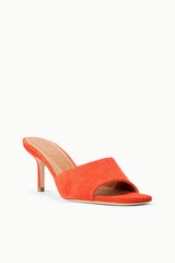 Orange suede mule sandal with open toe and slim stiletto heel, cushioned slip-on fit.