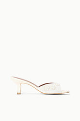 White textured open-back mule sandal with mid-height heel, side view