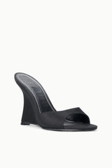 Black satin high-wedge slide sandal, angled view with open toe