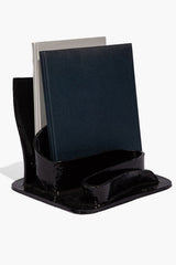 Black glazed wavy stationary holder with curved slots for notes and pens