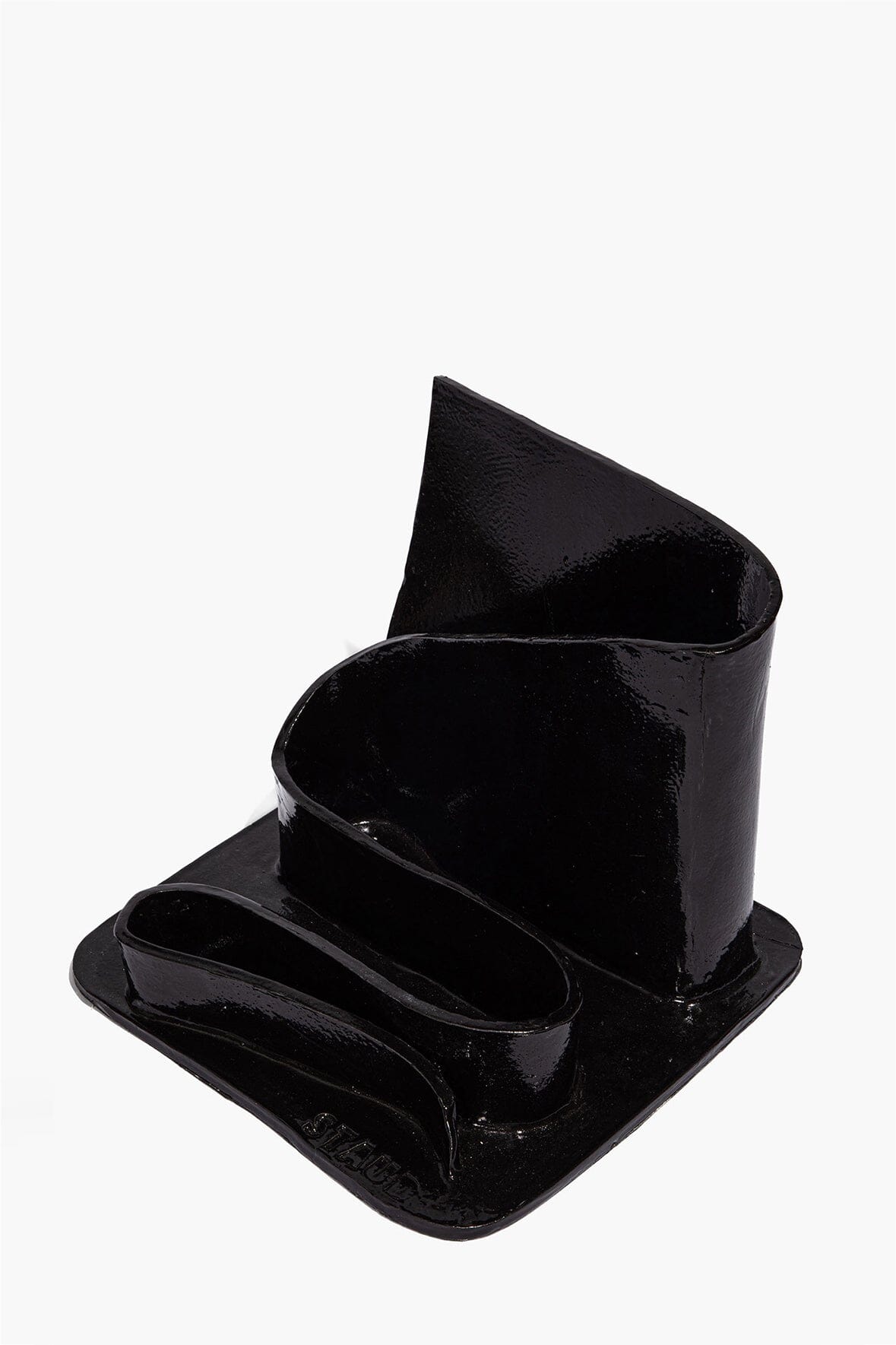 Black glazed wavy stationary holder with rounded pen slot and front base