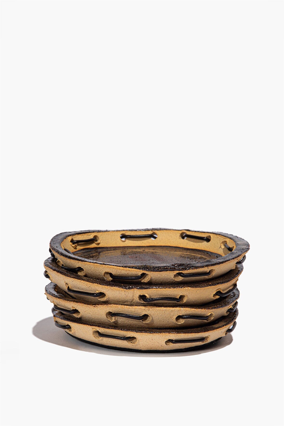 Ceramic leather-look coaster set, stack of five round coasters with rim detail
