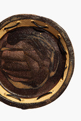 Round ceramic leather-look coaster, top view with curved tan outer ring
