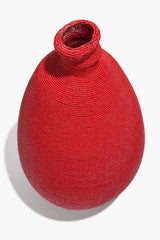 Red hand-beaded vase with rounded body and coiled beaded neck