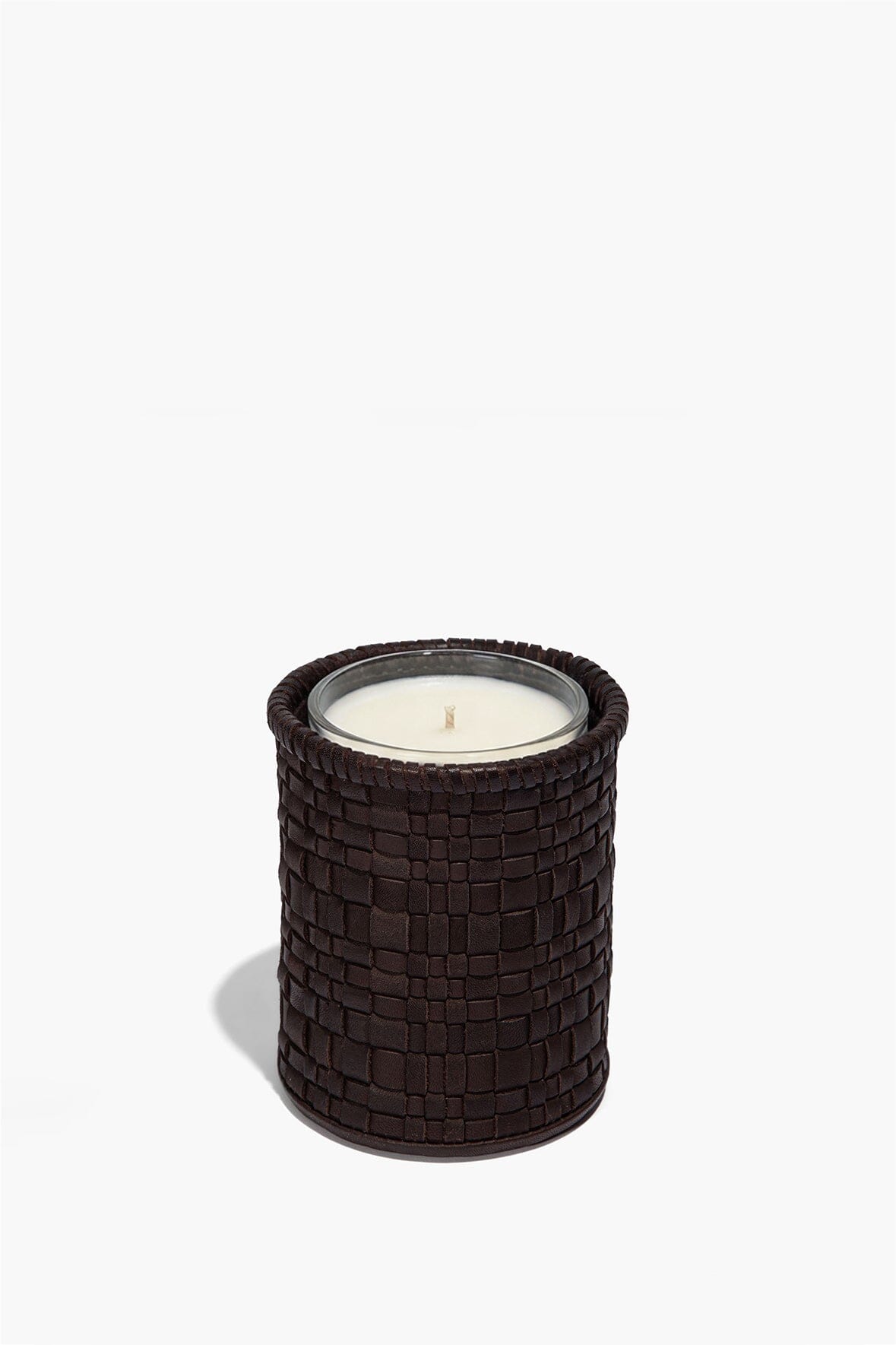 Espresso woven leather candle holder with lit candle inside and textured wrap