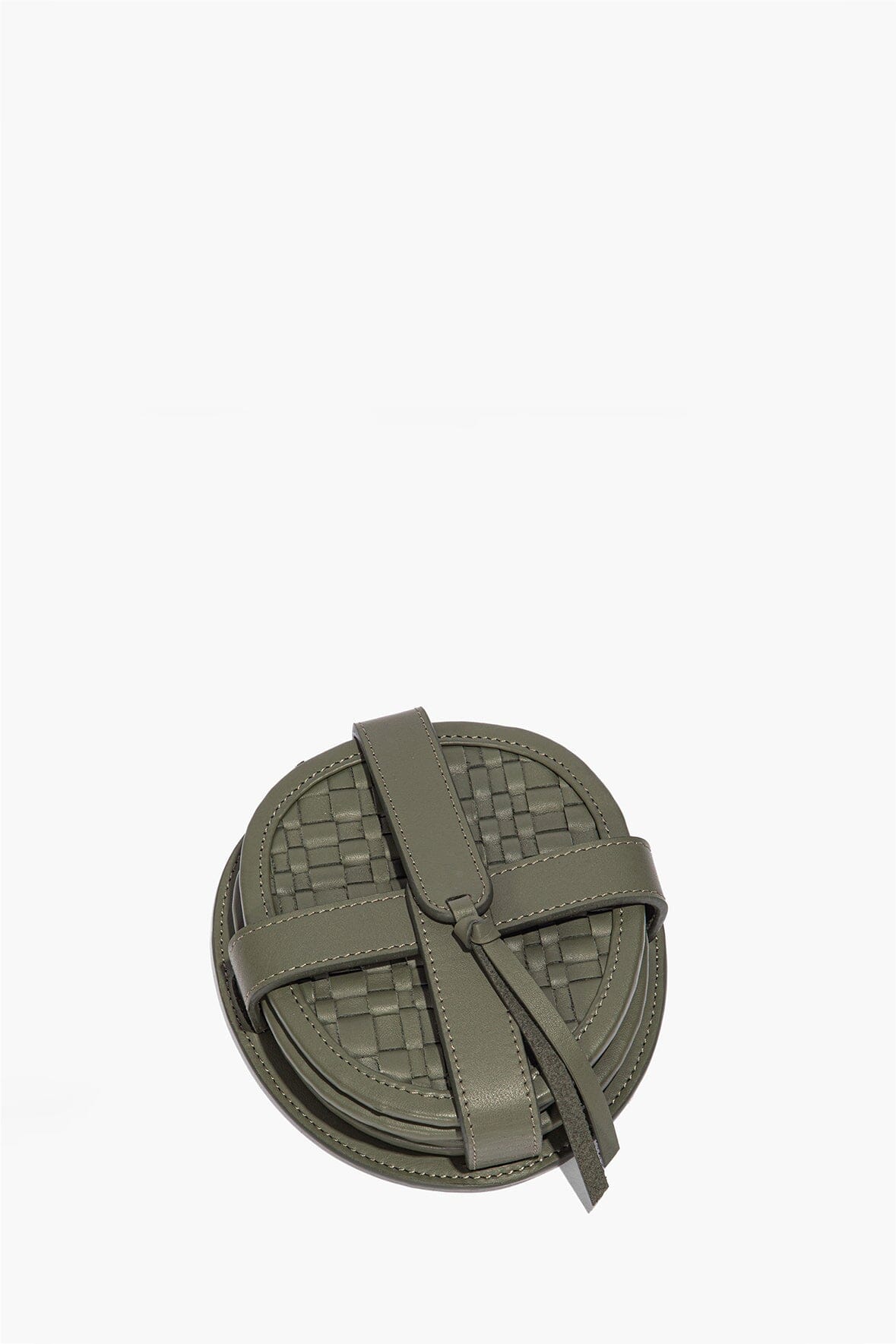 Moss woven leather coaster set held by a leather wrap strap