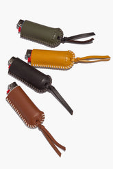 Leather lighter covers, assorted colors with stitched edges and tied tassels