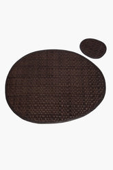 Leather placemat in dark espresso, oval shape with woven basketweave pattern