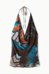 Printed sleeveless halter top with draped cowl front and butterfly-sky pattern