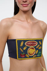 Navy tube top with close-up colorful embroidered emblem patch and yellow border