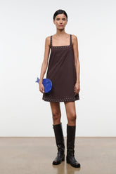 Dark brown sleeveless shift dress with square neckline and studded trim at hem and straps