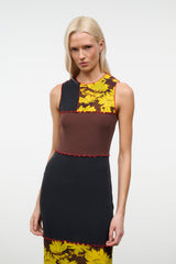 PRIMO sleeveless dress with round neckline, black bodice, brown panel, yellow daisy print