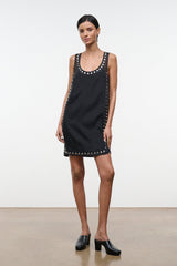 Black sleeveless mini dress with stud-trim detail at neckline and hem
