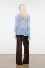 Back view of dark brown wide-leg silk dupioni pants with relaxed straight legs