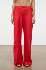 Front view red silk dupioni flared pants with elastic waist