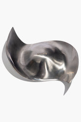 Silver metal ashtray with sculpted bowl and pointed rim