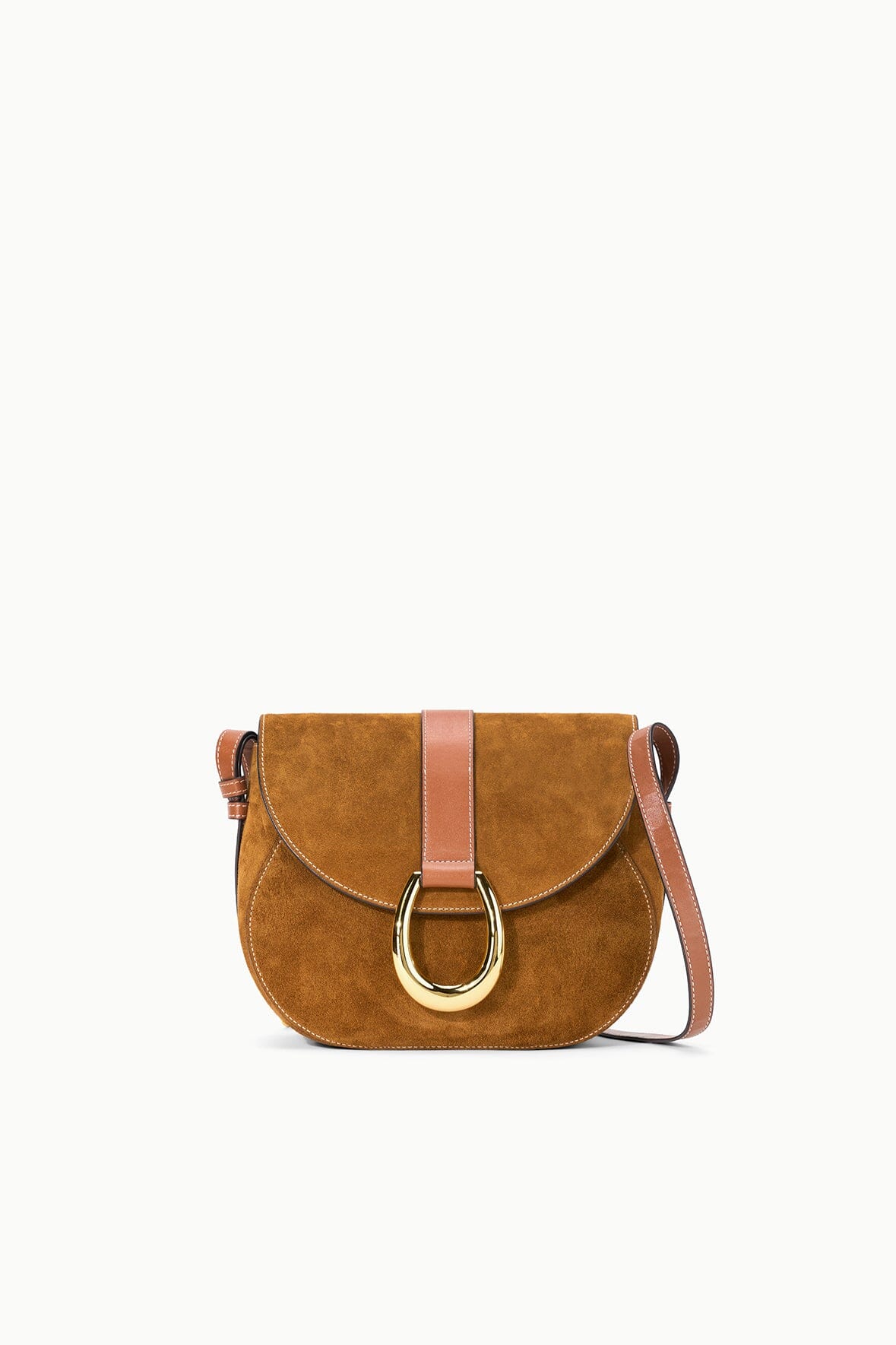 Tan suede saddle bag with flap and gold-tone ring buckle, crossbody strap.