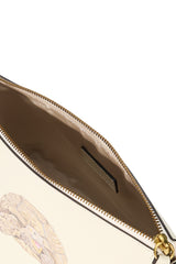 Cream pouch interior view with fabric lining and gold-tone zipper