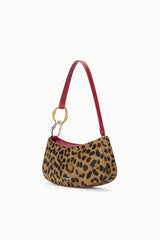 Cheetah-print shoulder bag with burgundy strap, gold ring hardware, compact shape