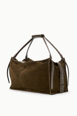 Large truffle suede bag with dual top handles, side tassels, and contrast trim