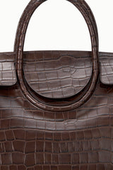Croc-embossed leather carryall with oval top handle and textured front