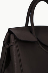 Espresso brown textured leather carryall with top handles and front flap clasp.