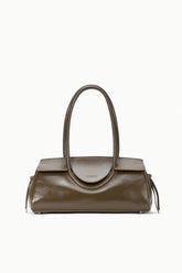 Truffle Maude shoulder bag in brown leather with curved handle and embossed logo trim