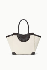 Two-tone tote bag with cream canvas body and dark leather handles