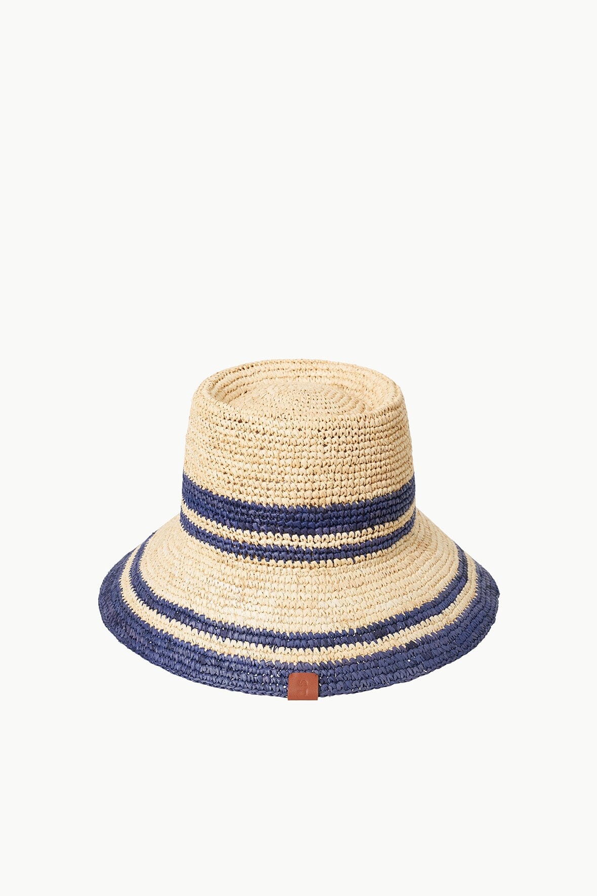 Striped straw bucket hat with navy bands and tan leather logo patch