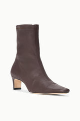 Espresso dark brown ankle boot with sock-style shaft and slim square heel