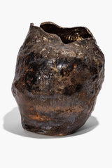 Ceramic vase with dark earth-brown speckled glaze, irregular rim and wide open top