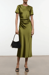 Silk dress in olive green with short sleeves, fitted waist, and midi length